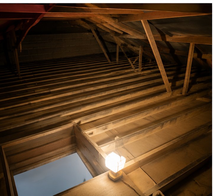 Loft floor before insulation in Bristol — exposed joists