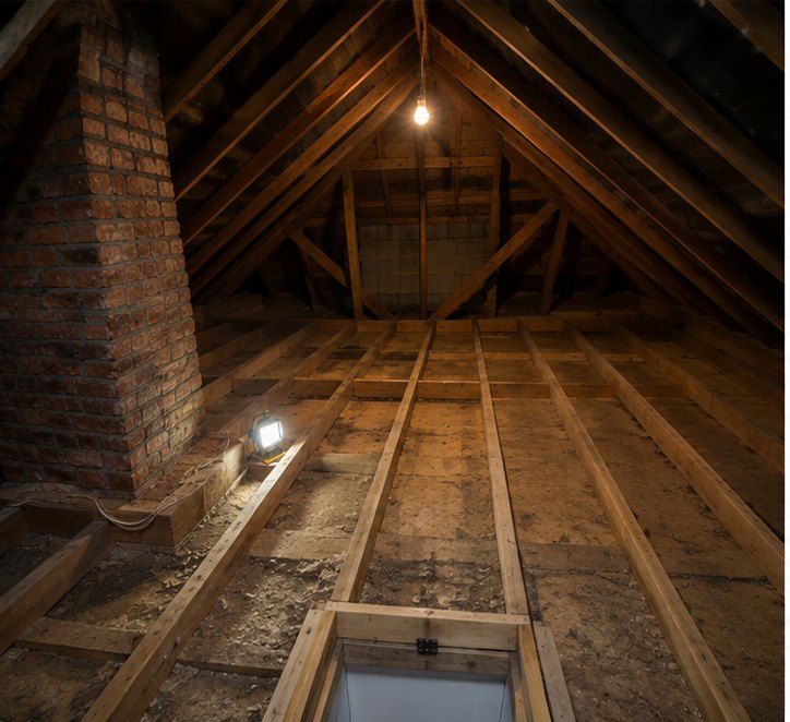 Loft floor before insulation in Portsmouth — exposed joists